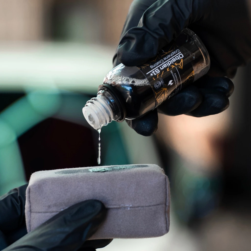 Ceramic coating being applied to an applicator pad