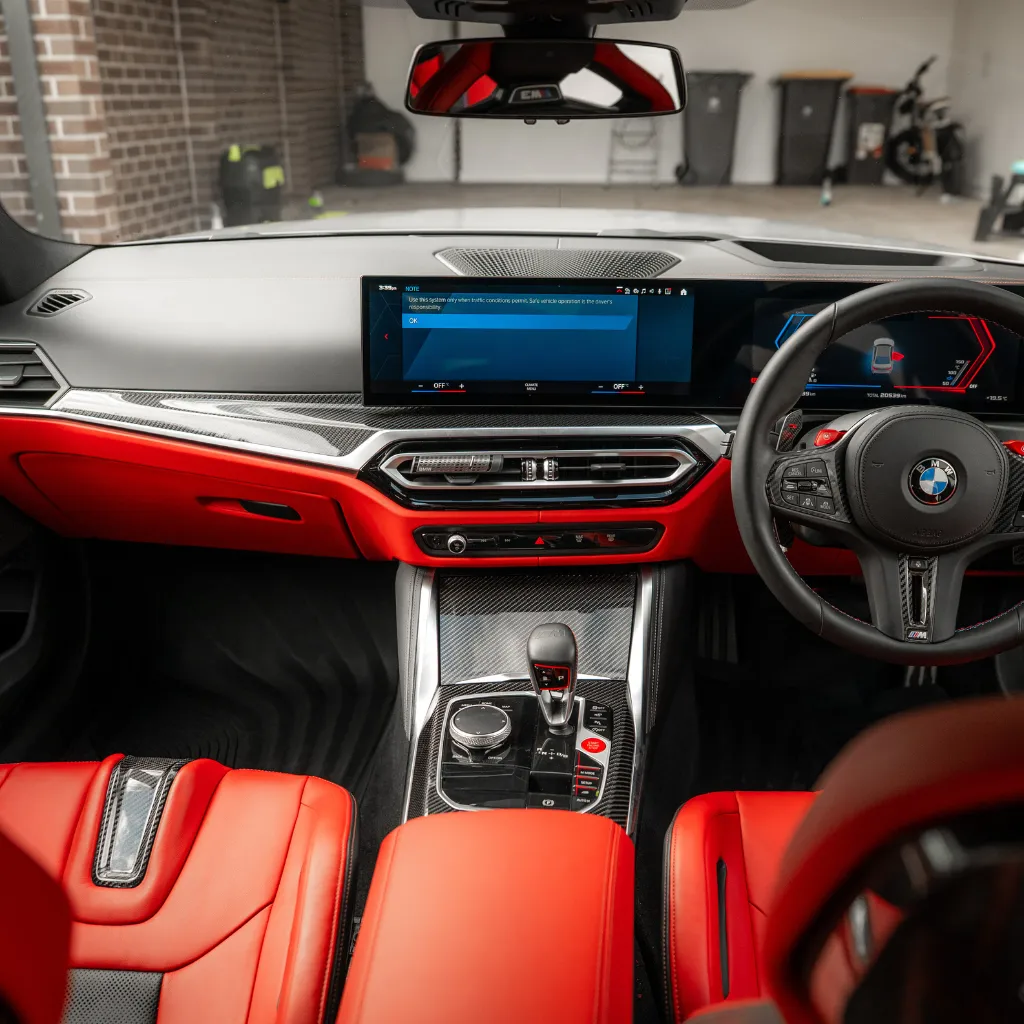 Detailed BMW interior with red leather seats